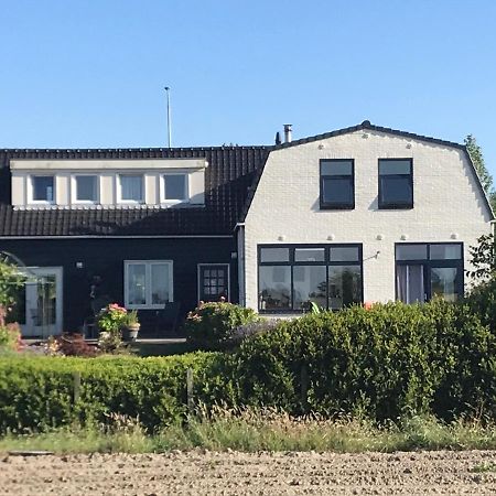 T Huuske Tuinappartement Met Fantastisch Uitzicht, Nabij Zee Zonnemaire Exteriér fotografie